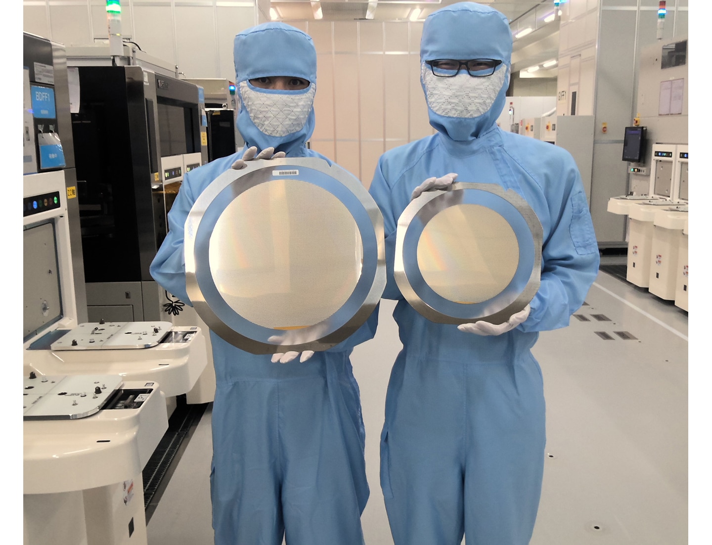 Line for processing 12-inch Si wafers (8-inch wafer on right)